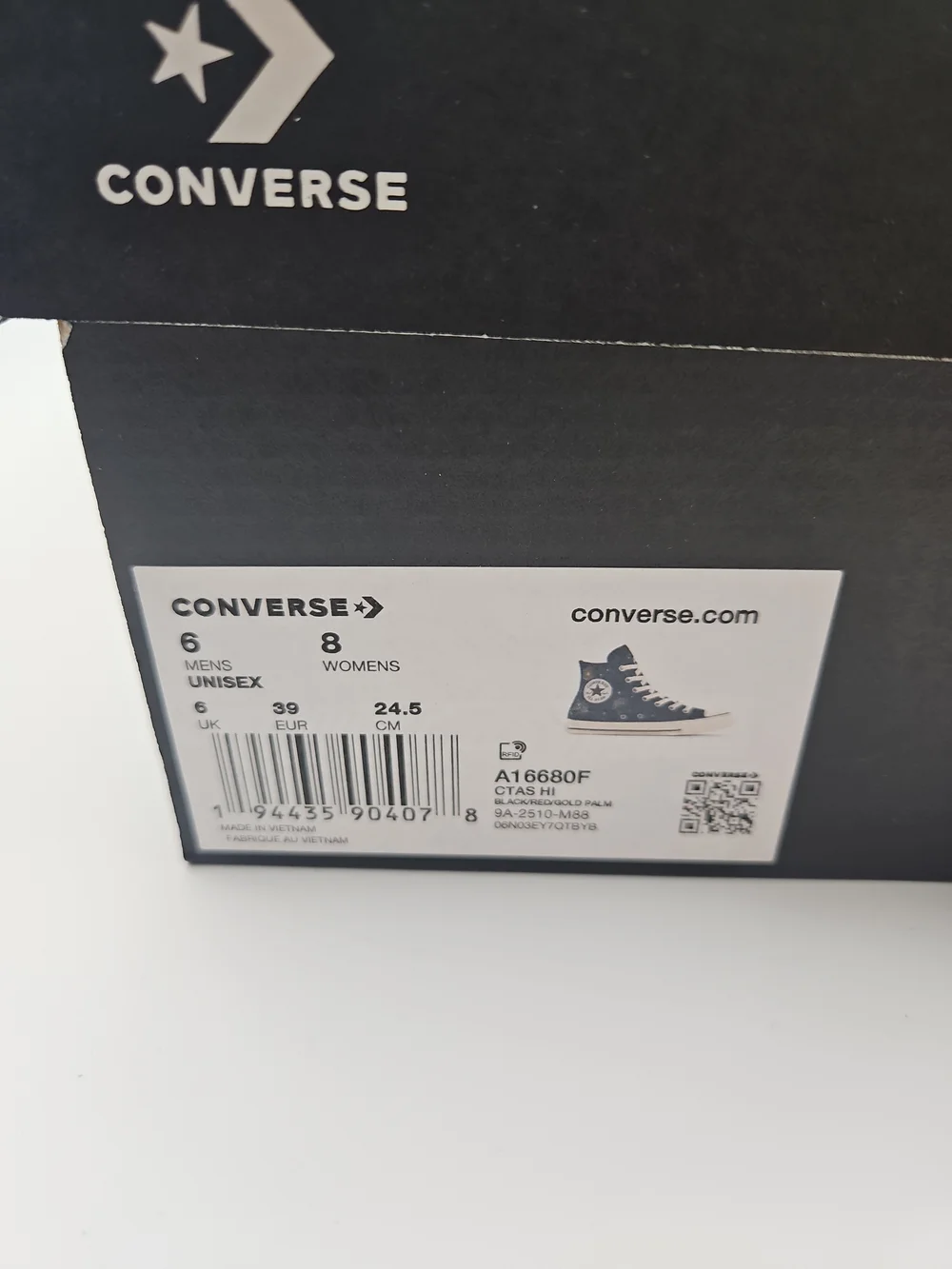Converse Black High-Top Sneakers with Multicolor Embroidered Motifs